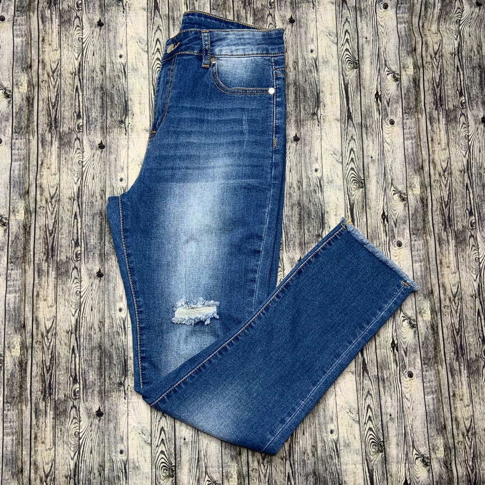 Fringed blue jeans